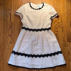 Elegant Cream Dress with Black Accents